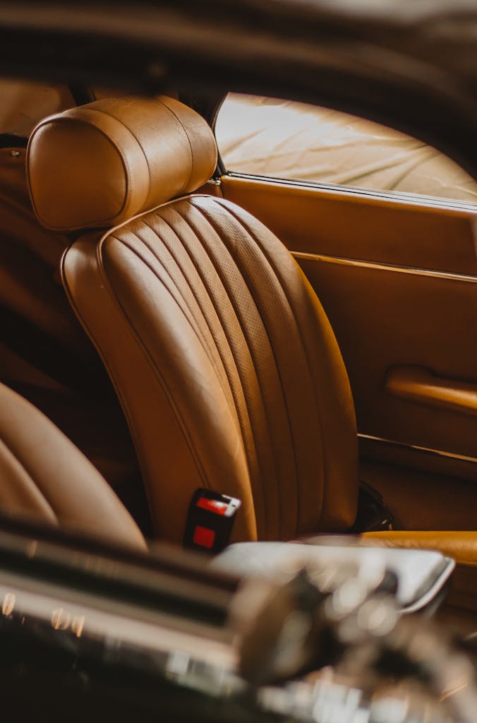 Luxurious tan leather car seat interior, exuding elegance and sophistication.